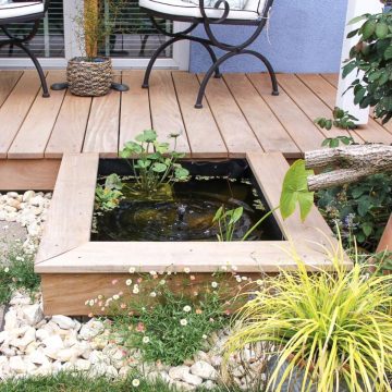 Finished above-ground-pond in garden.
