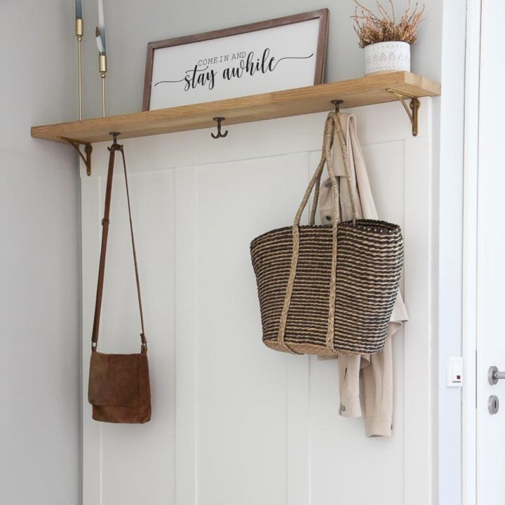 Featured image for the post Hallway Paneling DIY with hooks and shelf